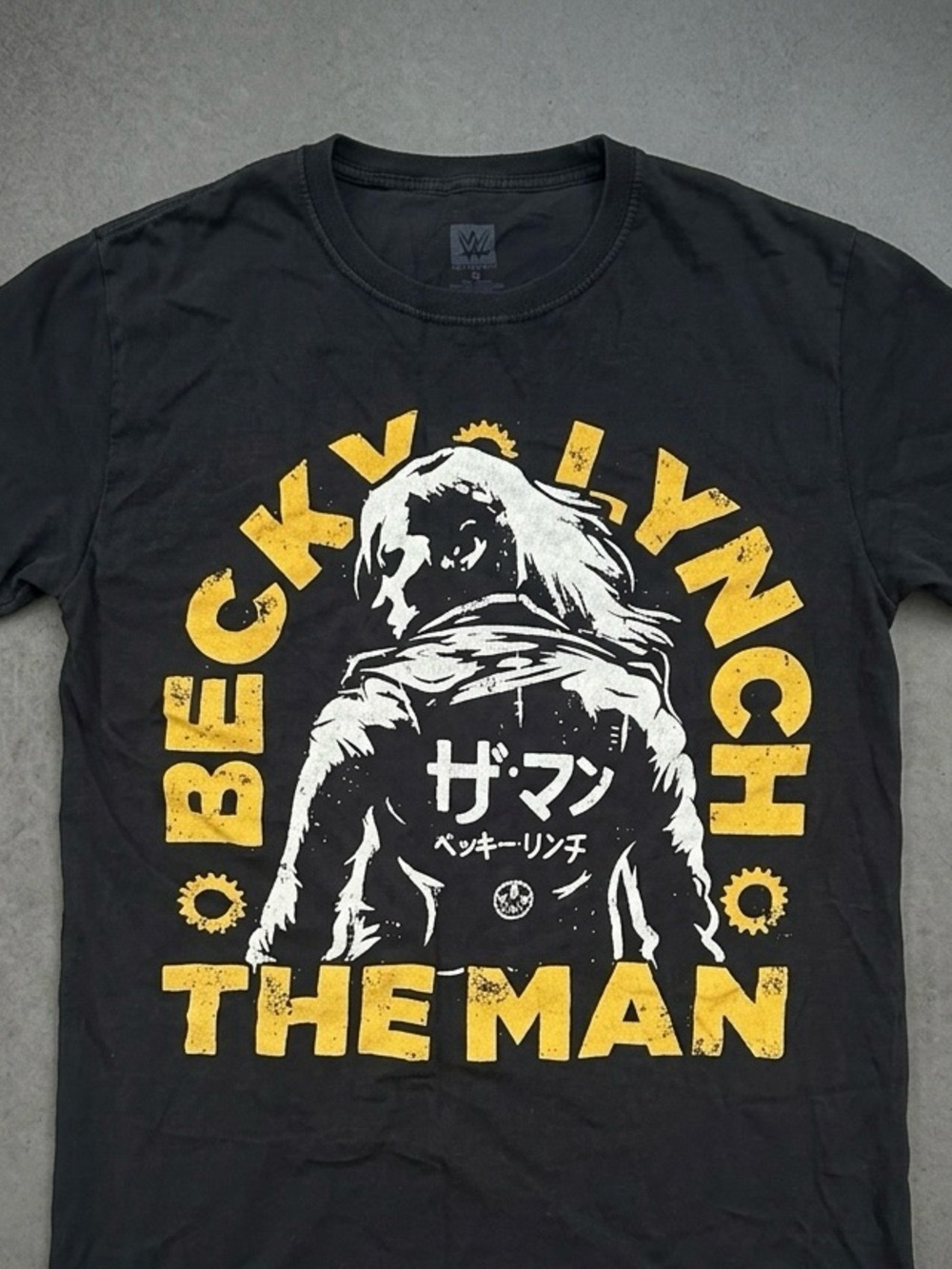 WWE Black Graphic Tee with Yellow and White Front Print